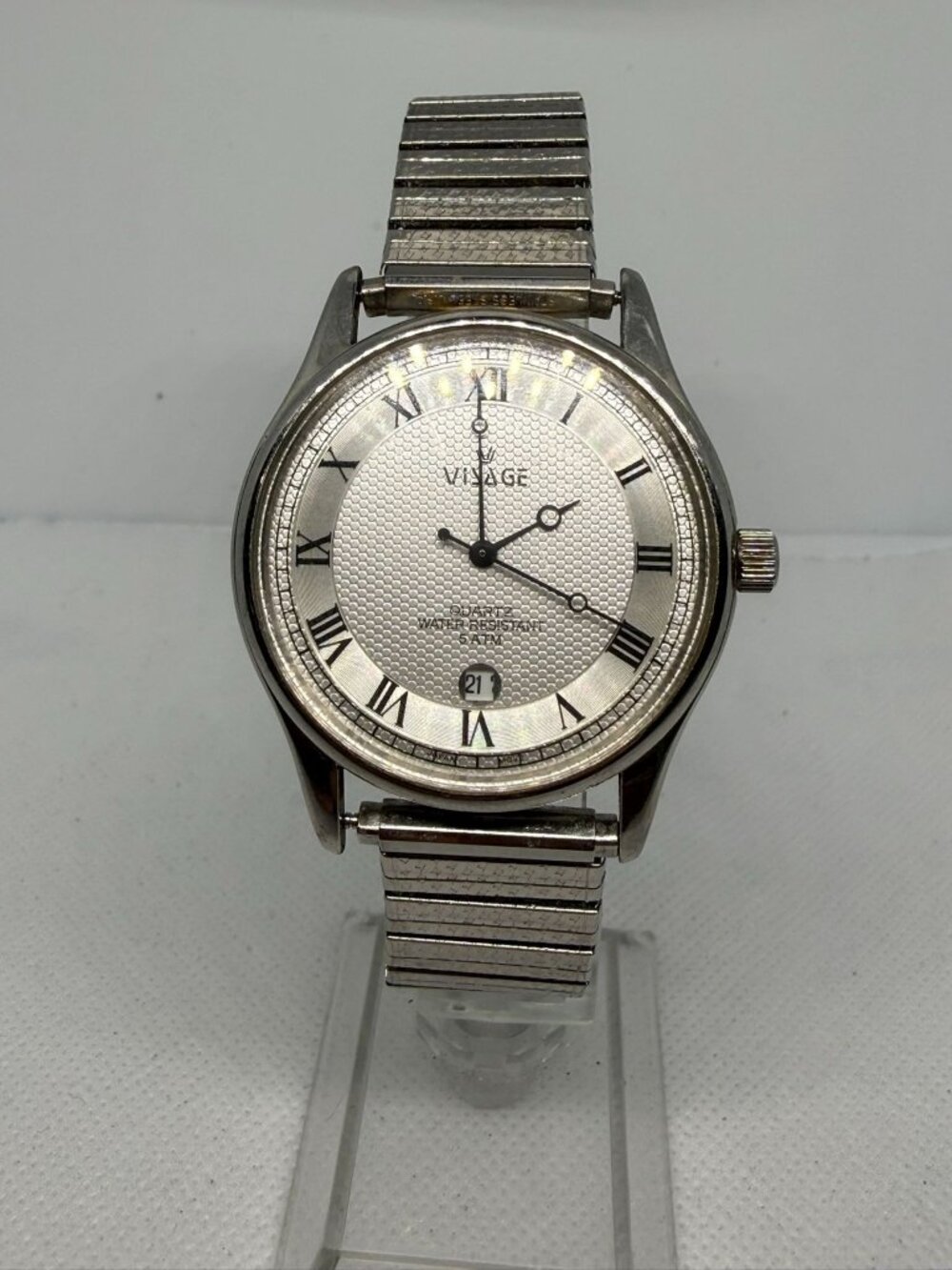 Visage Quartz Wristwatch Silver Dial Textured Center Roman Numerals 13370
